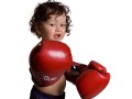 crianca-com-luvas-de-boxe-foto-anetta-shutterstock-0000000000000051